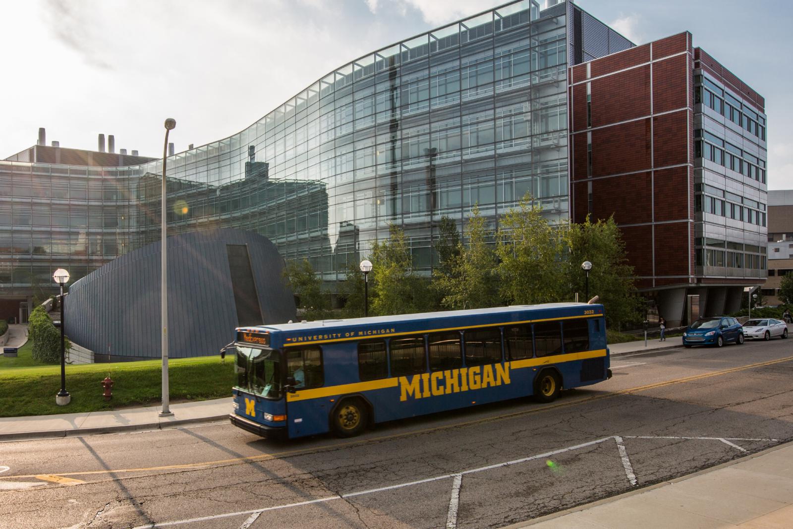 University of Michigan blue bus stops by the Biomedical Sciences Research Building