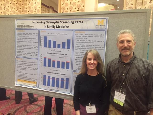 Dr. Greenberg and Dr. Ursu with poster at STFM Conference.