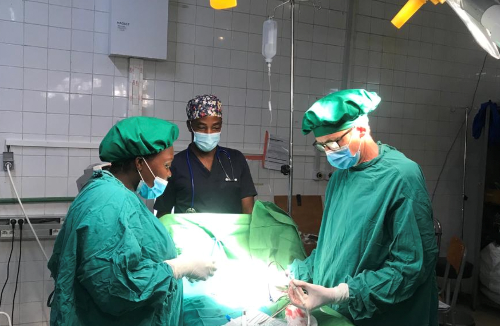Dr. Bradley and the fellows in the OR