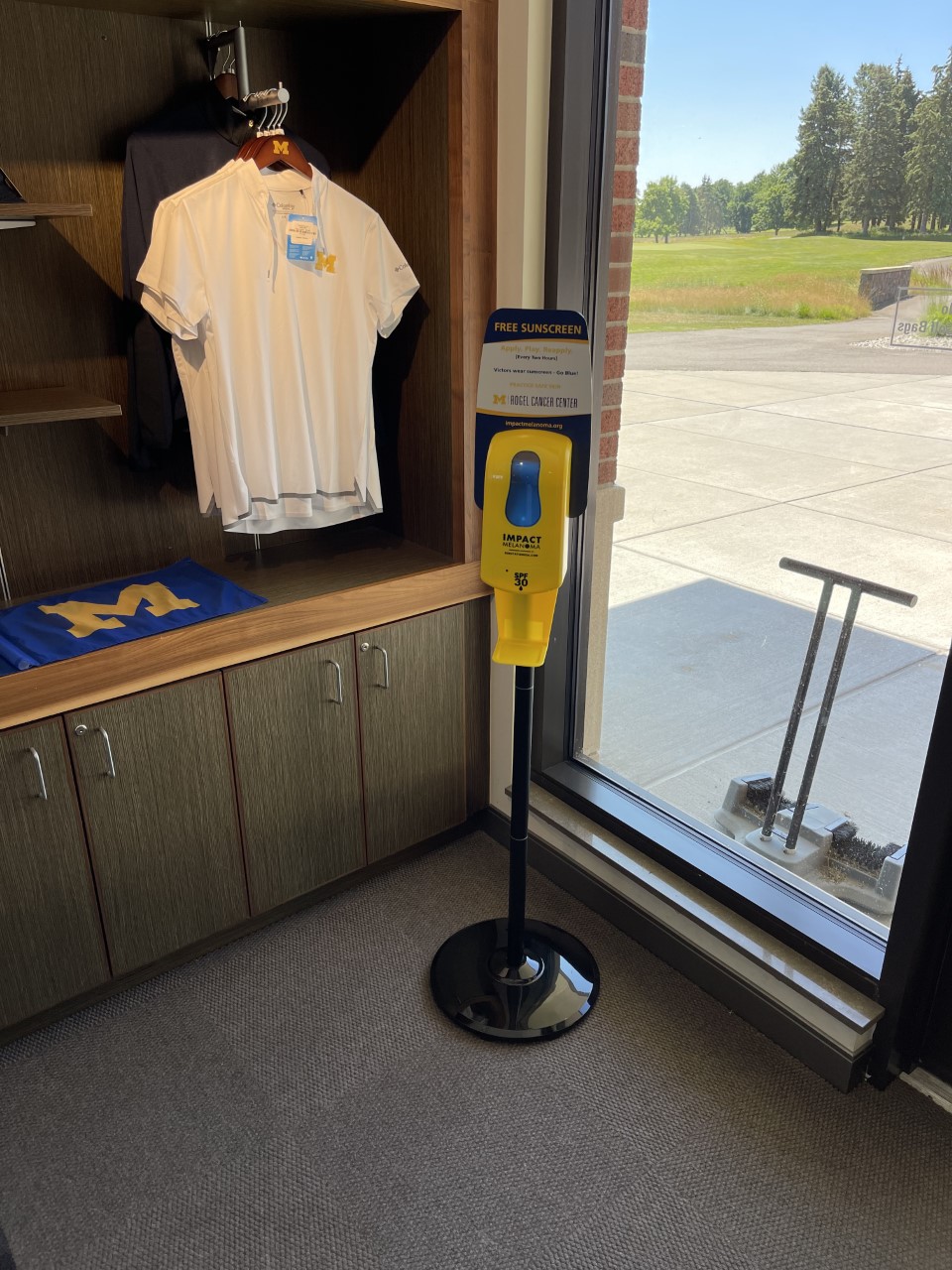 A sunscreen dispenseer located at U-M's golf course