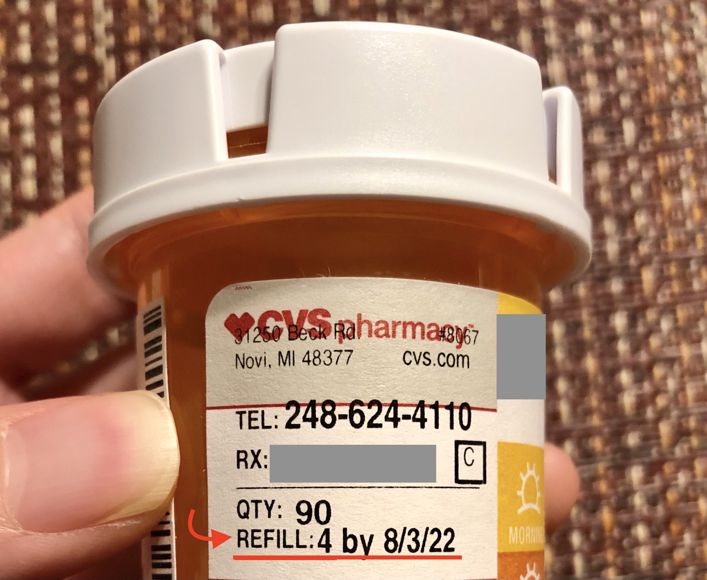 Medicine bottle with refill number