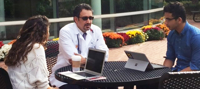 Dr. Dinesh Khanna mentoring two Undergraduate Research Opportunity Program students