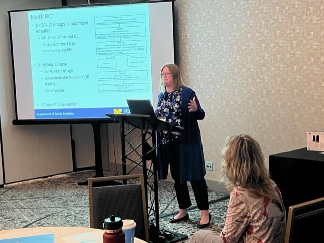 Dr. Lorraine Buis conducts an oral presentation at the 2023 NAPCRG conference