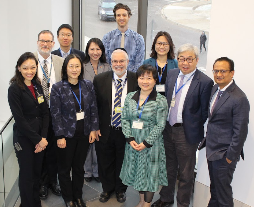 Group shot of visitors from Peking University and PM&R faculty/staff