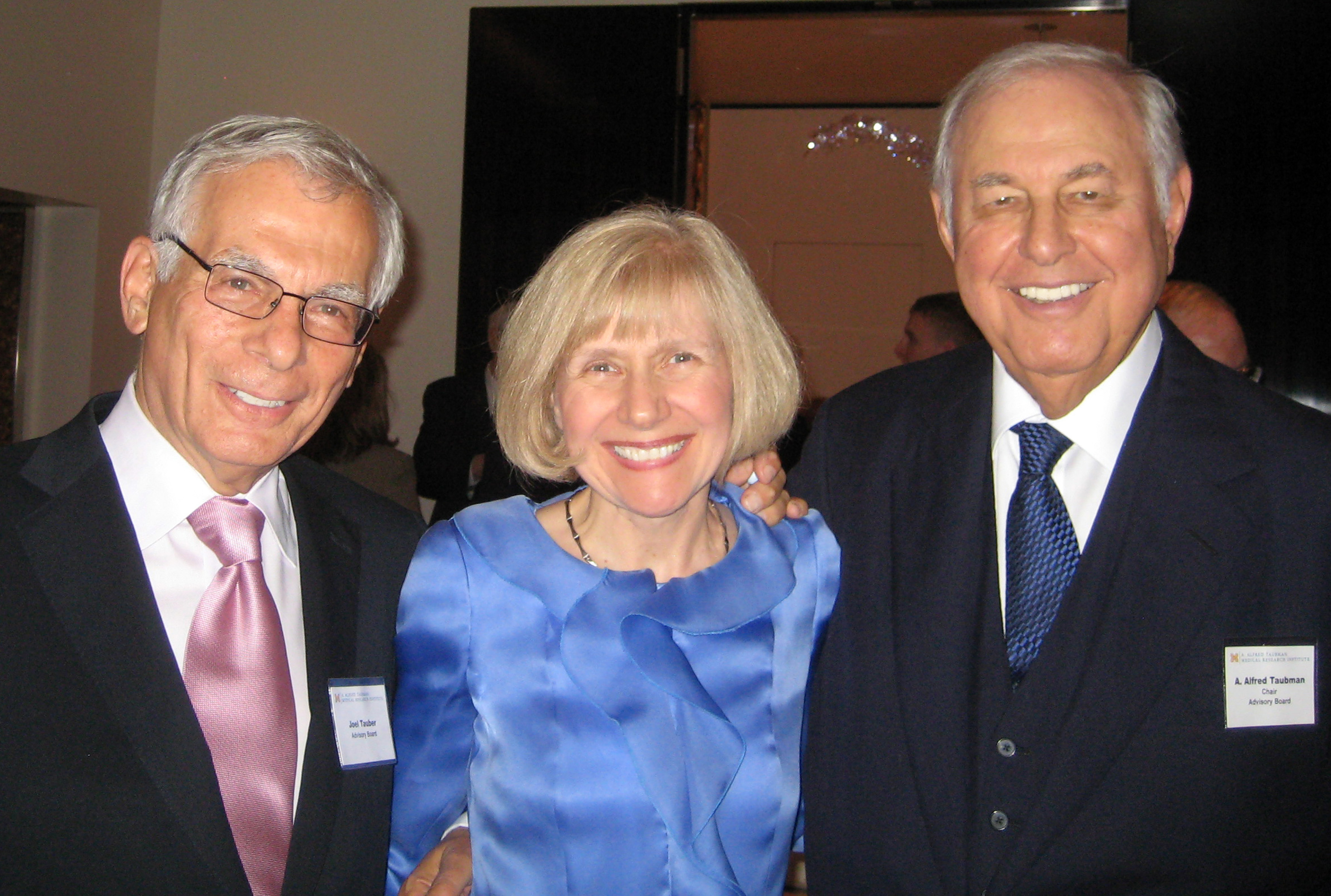 photo of Joel Tauber, Dr. Eva Feldman and A. Alfred Taubman