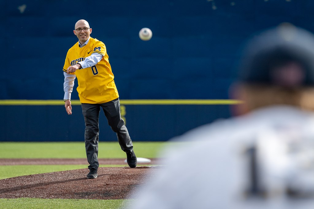 photo of Pranger ALS Clinic Director Stephen Goutman throwing out the first pitch of the StrikeOut ALS Michigan Baseball Game