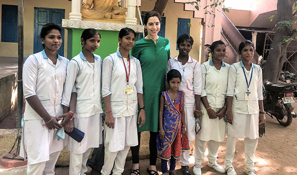 Emily Schehlein, MD, with students in India