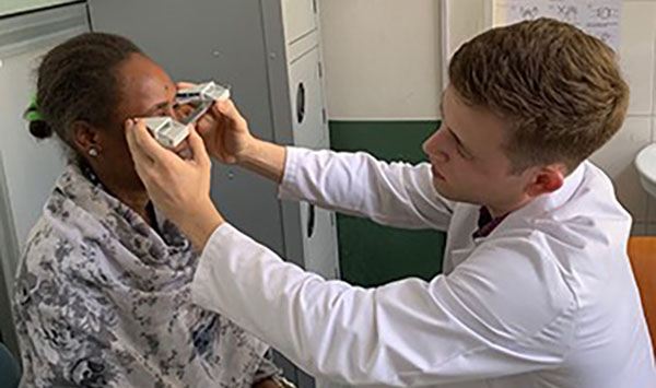 Doctor performing an eye exam