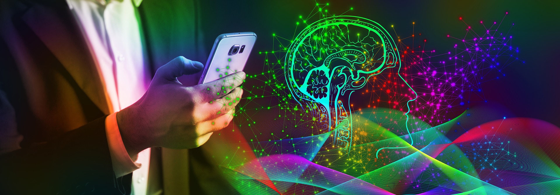 Image of a person using a computer next to a brain 