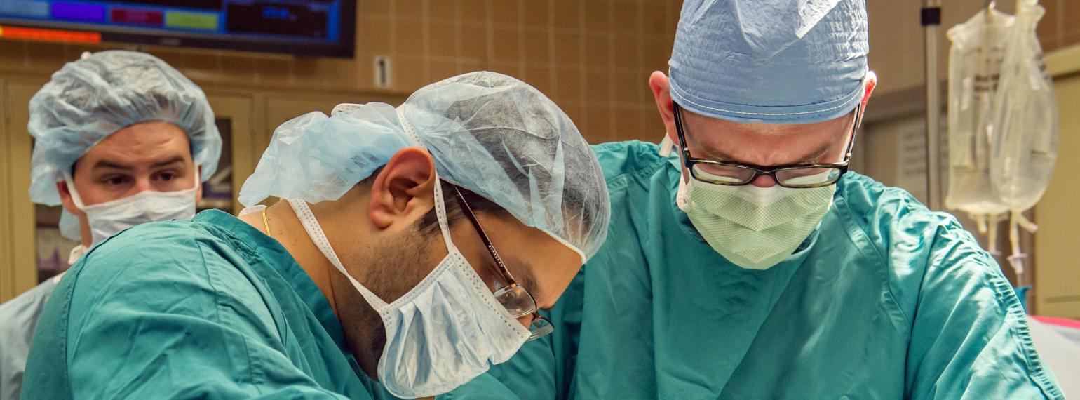 Dr. Englesbe and team member in the operating room
