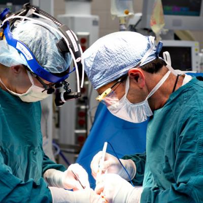 Dr. Hirschl and Dr. Arnold in the operating room