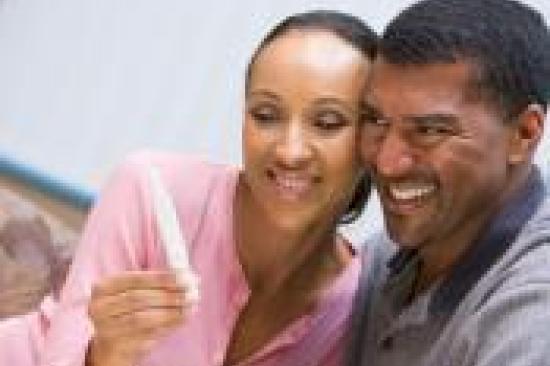 Couple holding a pregnancy test