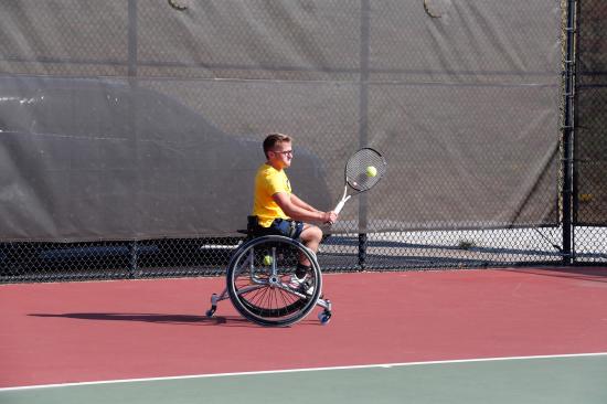 Kelley playing tennis