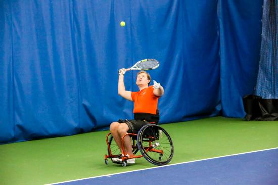 Matt Fritzie playing wheelchair tennis