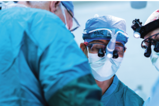 Three doctors in operating room