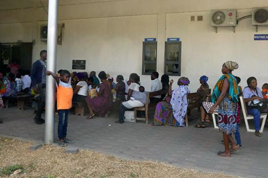 Crowd of people waiting for eye care in Ghana