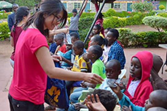 Dr. Sherry Day with children in Kenya