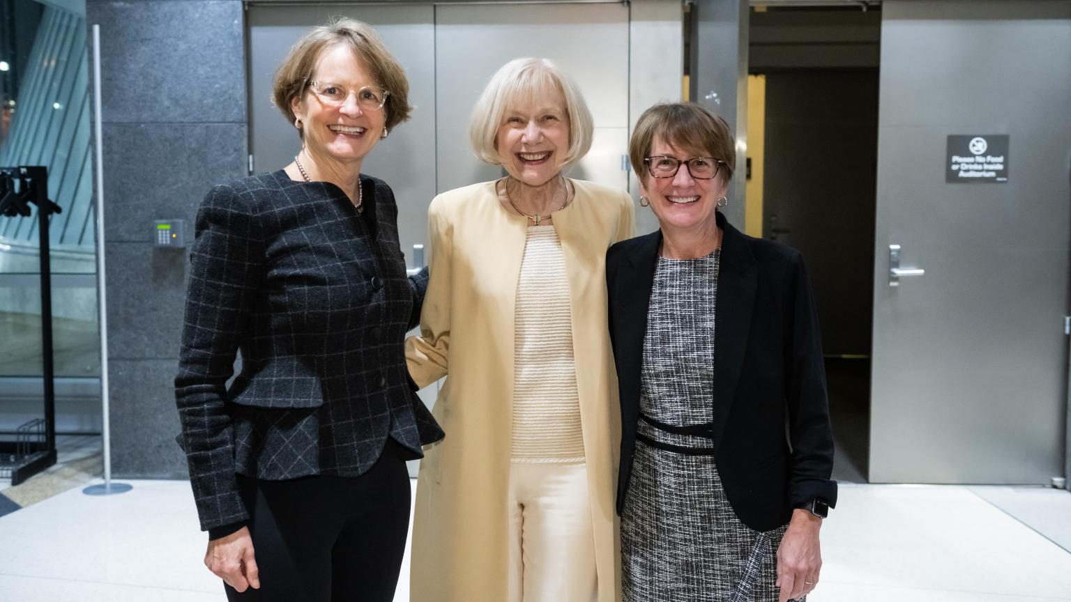 Photo of Provost Laurie McCauley, Dr. Eva Feldman and Dr. Donna Martin
