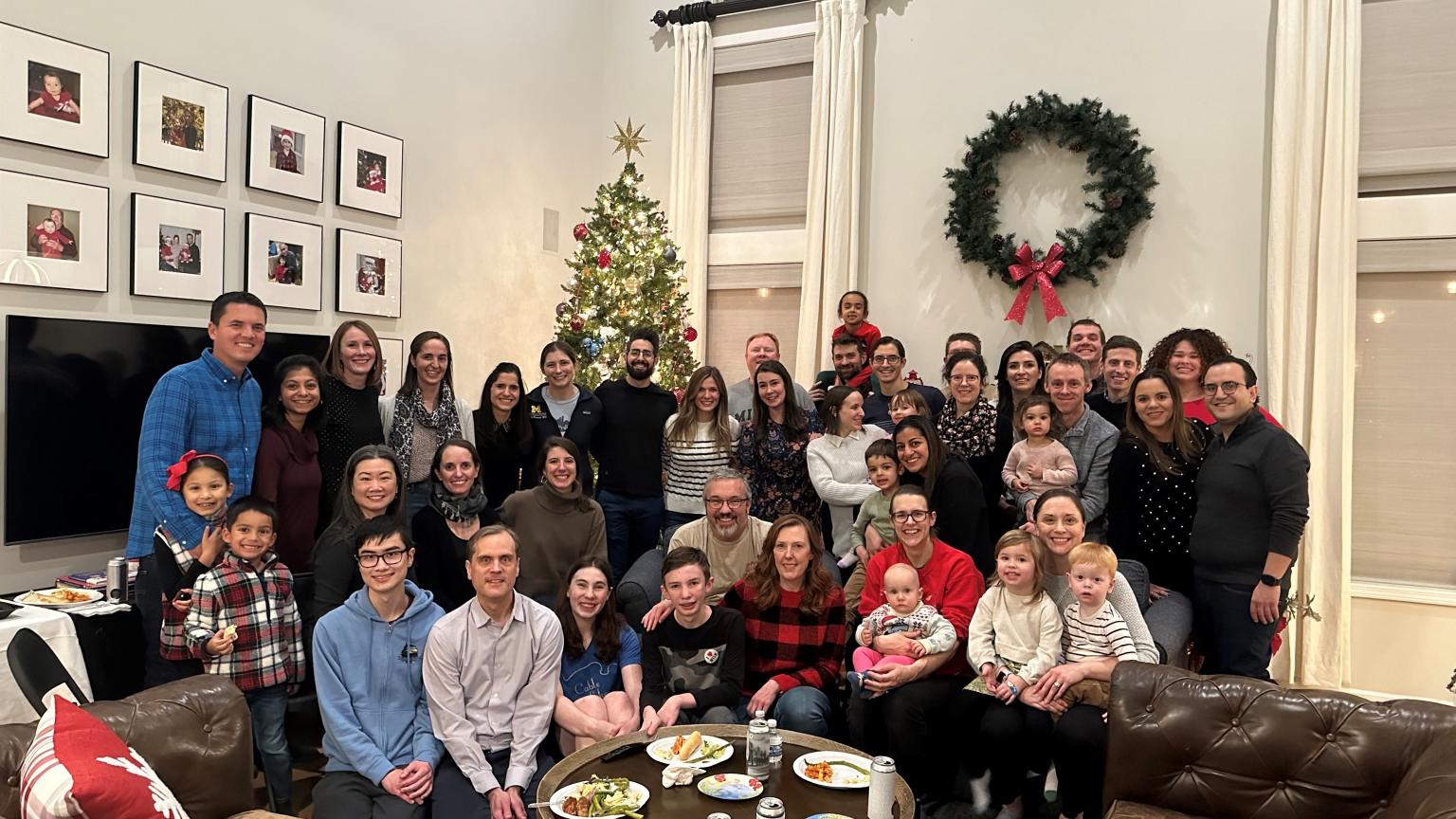 Pediatric Hospital Medicine Division Members gathered around for a holiday party.