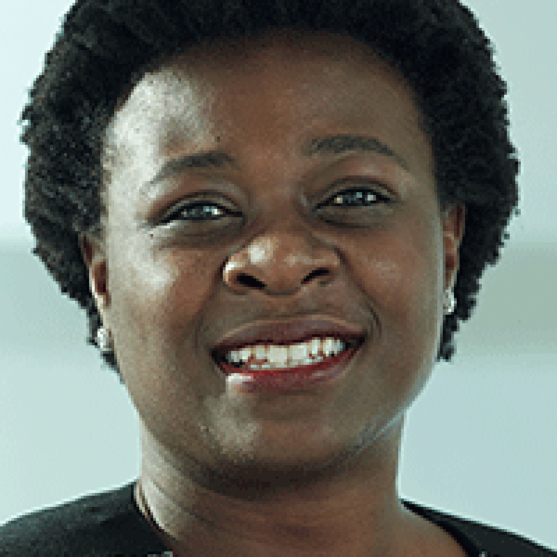 Headshot of Mercy Adetoye, M.D., M.S., a black woman with short black hair wearing a dark colored top