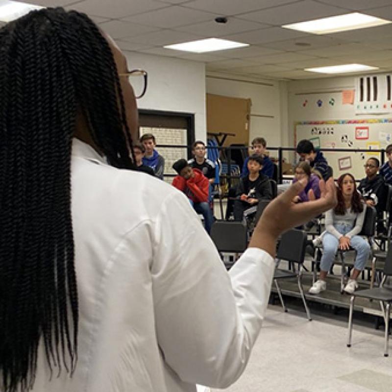 Physician speaks to middle school students