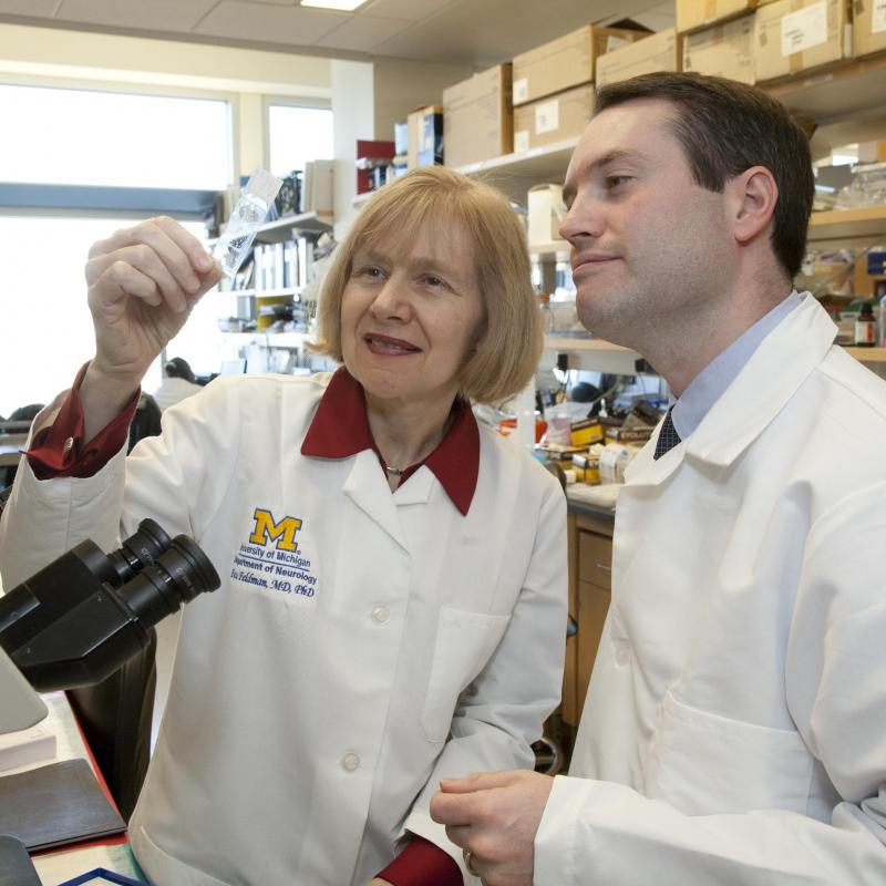 Eva Feldman, M.D., in the lab with Brian Callaghan, M.D.