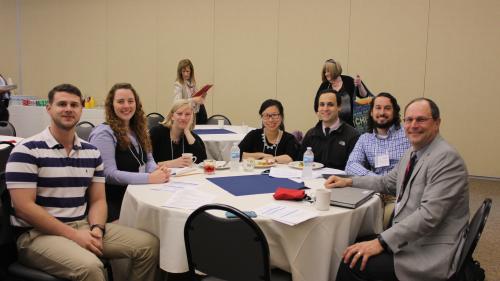 Residents and Dr. Eric Skye at MI Research day