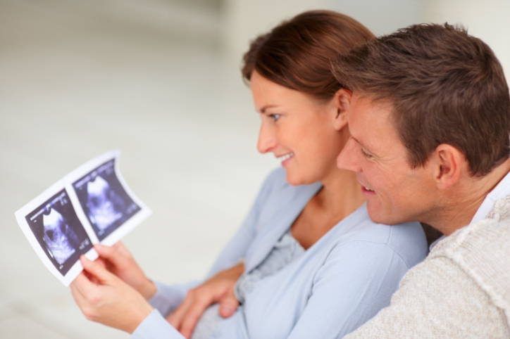 Couple looking at an ultrasound